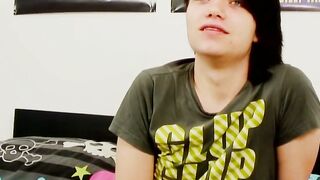 Young gay man with long hair strokes it hard