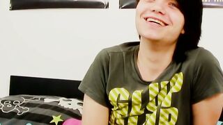 Young gay man with long hair strokes it hard
