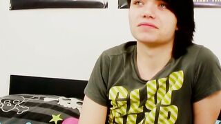 Young gay man with long hair strokes it hard