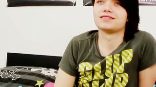 Young gay man with long hair strokes it hard
