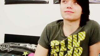 Young gay man with long hair strokes it hard