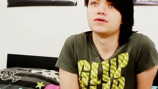 Young gay man with long hair strokes it hard