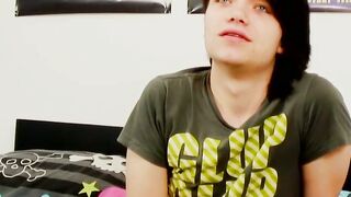Young gay man with long hair strokes it hard
