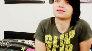 Young gay man with long hair strokes it hard