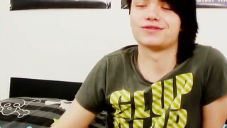 Young gay man with long hair strokes it hard