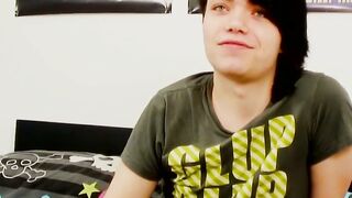 Young gay man with long hair strokes it hard
