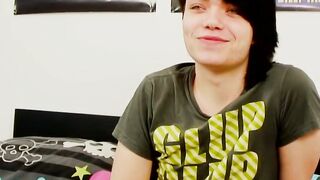 Young gay man with long hair strokes it hard