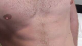 Sexy bearded stallion Logan masturbates his throbbing cock