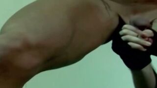 Wildcats fan lifting dumbbell during naughty workout