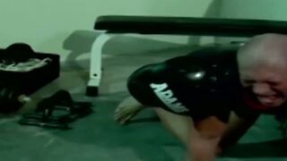 Wildcats fan lifting dumbbell during naughty workout