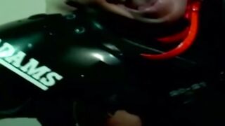 Wildcats fan lifting dumbbell during naughty workout