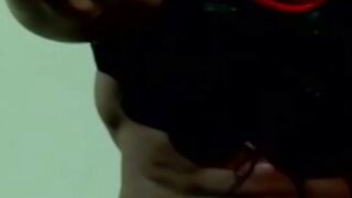 Wildcats fan lifting dumbbell during naughty workout