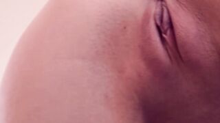 Sensual brunette shows both of her tight little holes off