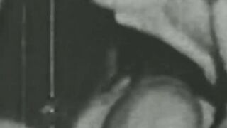 Black and white vintage video of lady sucking her lover