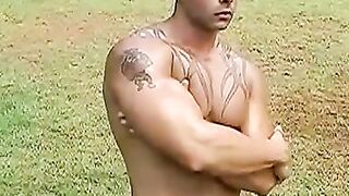 Kinky Brazilian jock masturbates on football field solo