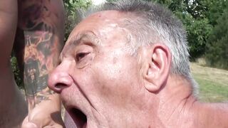 Old gay man lets his mouth be filled with a young cock