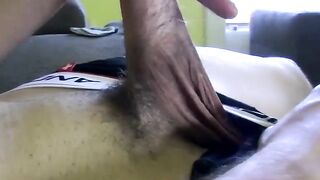 Handsome twink Jimmy Roman rubs big dick over underwear