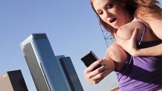 Redhead teen posing nude on the rooftop