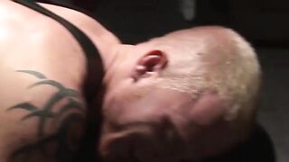 Bondage muscle hunk spanked hard in dark BDSM dungeon