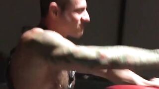 Bondage muscle hunk spanked hard in dark BDSM dungeon