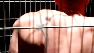 Blindfolded muscle slave dominated and teased in cage