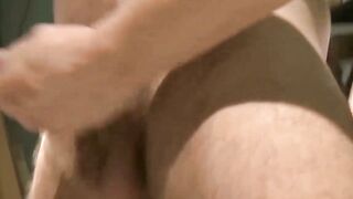 Gorgeous submissive gay tied up and doused in a warm jizz
