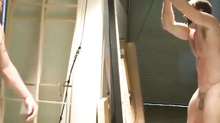Gorgeous submissive gay tied up and doused in a warm jizz