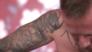Inked seductress spreads legs before riding big cock