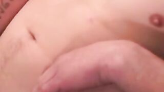Tattooed stallion jerks off his cock in passionate solo act