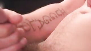 Tattooed stallion jerks off his cock in passionate solo act