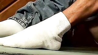 Skinny twink watches his feet and cums on them after jerking