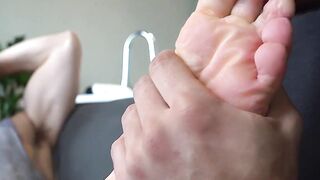 Handsome Latino gives his friend a foot massage and worship