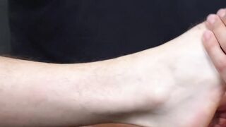 Handsome Latino gives his friend a foot massage and worship