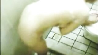 Busty Indonesian Auntie spied in shower