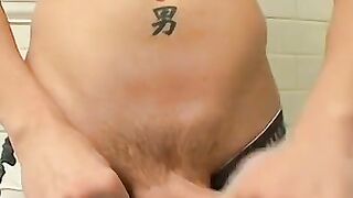 Young gay Beau Marcus gets aroused in shower and jerks off