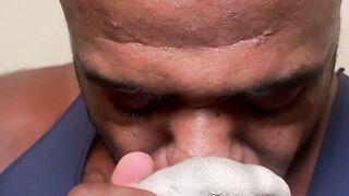 Black hunk sucks toes and licks feet of young smooth amateur