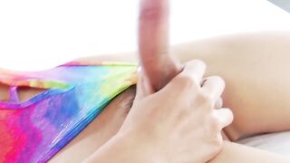 Slim Asian tgirl in swimsuit jerks her cock until she cums