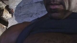 The big black dude jerks off in his secret haven at home the basement