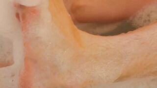 Twink showers and massages his feet before jerking off