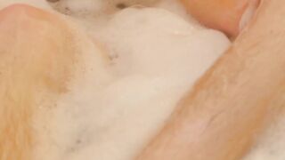 Twink showers and massages his feet before jerking off
