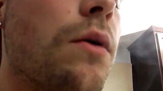 Horny stud Dustin Fitch likes taking a smoke while jerking