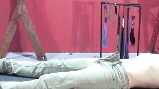 Petite slave restrained for rough BDSM tormenting session