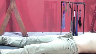 Petite slave restrained for rough BDSM tormenting session