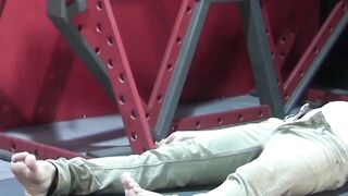 Petite slave restrained for rough BDSM tormenting session