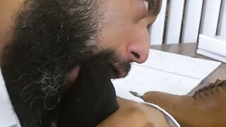 Bearded black stud licks his bosses feet while masturbating