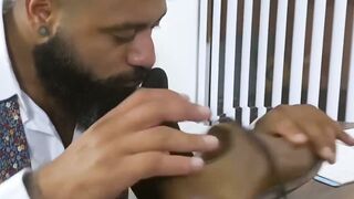 Bearded black stud licks his bosses feet while masturbating