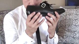 Cute man in a seductive suit Dakota Payne sniffs his socks