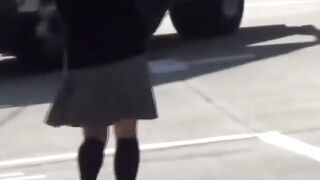Delectable Japanese babe is peeing outside during day time