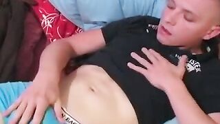 Hot and skinny twink jerking his big fat cock in bed