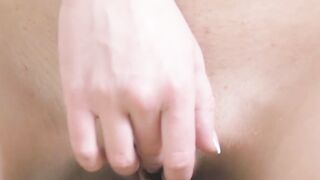 Erotic slow motion video of Davina E teasing her shaved vag